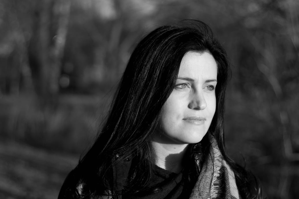 Grayscale Photo of Woman Wearing Scarf